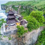 Wisata Religius di Kuil Batu Uluwatu: Sunset dan Kecapi Bali