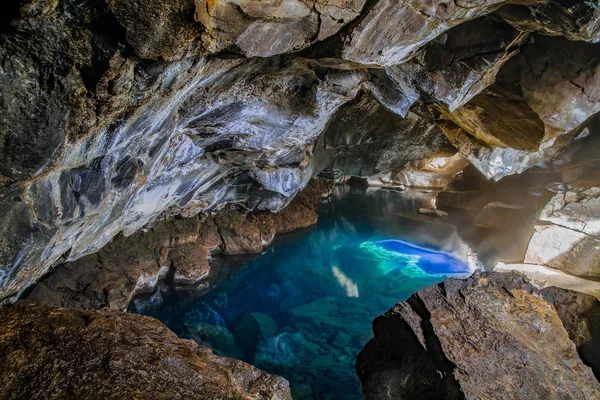 depositphotos_202704038-stock-photo-grjotagja-volcanic-cave-incredibly-blue